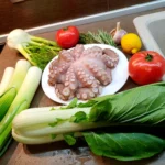 Oktopus zubereiten: Gemüse, Oktopus, Tomaten, Okra